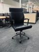 OFS Black Faux Leather Conference Chair (Black/Black)